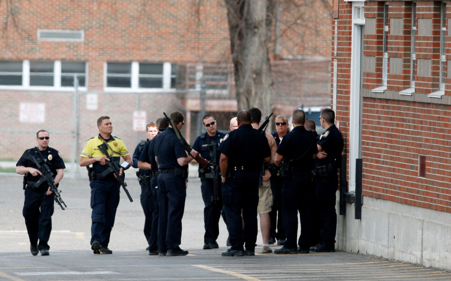 Billings police officers gather at the northeast corner
